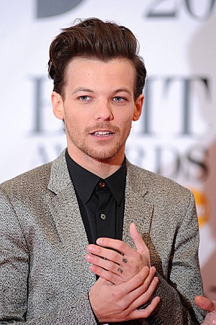 「ルイ・トムリンソン、延期になっていたワールド・ツアーの新日程を発表」